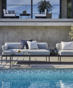 anholt outdoor sofa by they pool
