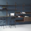 1RS_OFFICE_WRITINGBAR_MAGAZINE SHELVES_BLUE BACKGROUND_FROM THE SIDE_WALNUT_SCP BARCHAIR_STYLED (2)
